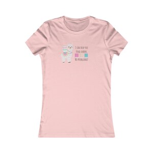 May include: A pink women's t-shirt with a cartoon llama carrying books. The text on the shirt reads "I can help you find a book. No problellama!"