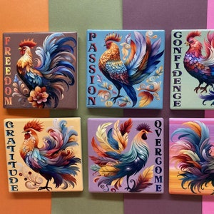 May include: Six square decorative tiles with vibrant rooster illustrations. Each tile has a different background colour and a word printed vertically: Freedom, Passion, Confidence, Gratitude, Overcome, and Fulfillment.