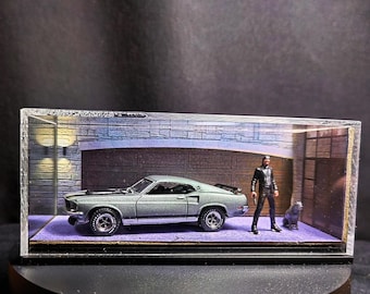 Diorama Johna Wicka w skali 1:64 w obudowie z pleksi