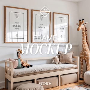 May include: Three wooden picture frames with a white background and the text "YOUR DESIGN HERE" in each frame. The frames are hanging on a white wall above a light brown couch with a light brown throw pillow and a stuffed giraffe toy. The text "FRAME MOCKUP" is written in white letters on a white background in the centre of the image.