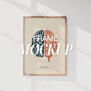 May include: A wooden frame mockup with a brain-shaped graphic inside. The graphic is blue and orange and says "FRAME MOCKUP" with the text "MATISSE" and "POSITIVE ALLIES WHO DESIGN" below the graphic.