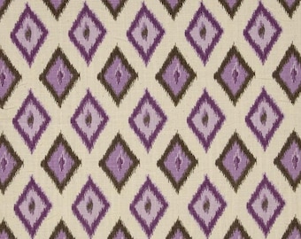 May include: Purple and brown diamond patterned fabric with a white background. The fabric has a woven texture.