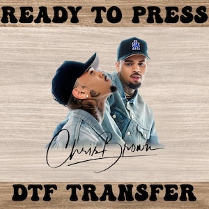 May include: DTF transfer featuring two men in denim jackets and baseball caps. The image includes the text "READY TO PRESS" at the top and "DTF TRANSFER" at the bottom. The signature "Chris Brown" is also visible.