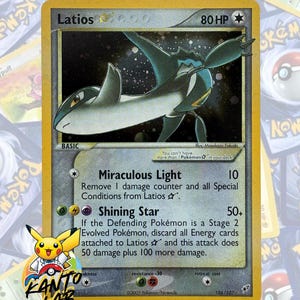 May include: A Latios trading card with 80 HP, featuring a dark blue and white creature illustration against a starry background. The card text includes Miraculous Light and Shining Star attacks, with a yellow border and a 2005 copyright date.