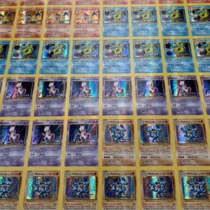 Hoja de presentación de las evoluciones de Pokémon XY: Charizard, Gyrados, Machamp y Mewtwo *Alta calidad*