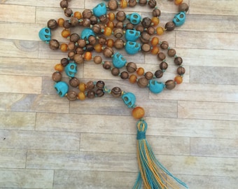 Turquoise skulls amber mala -108 beads hand knotted