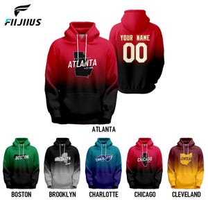 May include: A set of ten hooded sweatshirts with a gradient design. Each sweatshirt features a different city name and a basketball graphic. The sweatshirts are available in a variety of colors, including red, green, gray, blue, and yellow.
