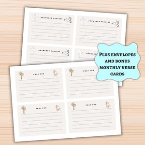 Puede incluir: Dos pilas de tarjetas de color crema con texto e ilustraciones impresos. Las tarjetas superiores dicen "ANSWERED PRAYERS" con una cruz y un gráfico de paloma. Las tarjetas inferiores dicen "PRAY FOR" con una cruz y un gráfico de manos rezando. El texto en una forma azul claro dice "PLUS ENVELOPES AND BONUS MONTHLY VERSE CARDS."