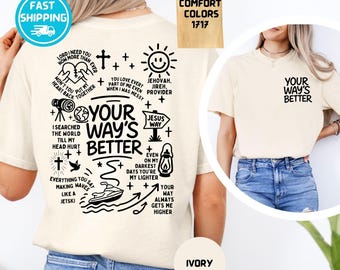May include: An ivory t-shirt featuring black graphic prints. The back displays the text 'YOUR WAY'S BETTER' surrounded by various icons and phrases, while the front chest area features the text 'YOUR WAY'S BETTER' in a smaller font.