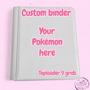 May include: A light gray custom binder with pink text that reads "Custom binder", "Your Pokémon here", and "Toploader 9 grids". The binder is rectangular and has a stitched border.