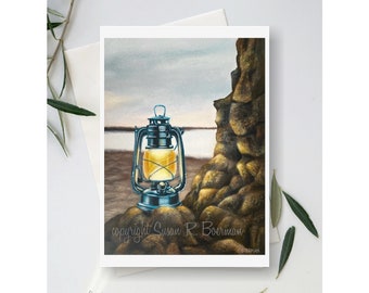 Lantern Blank Note Card, Blue Lantern sitting on rocks by the beach