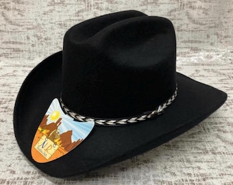 May include: Black felt cowboy hat with a braided leather band and a white and black label that says "N.R.  Nolan Ryan".