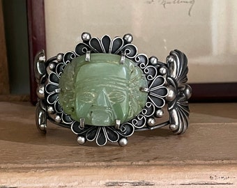 1940&#39;s Mexican Sterling Cuff with Pre Columbian Style Carved Mask