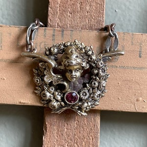 Antique Kerr Angel Cupid Pendant with Simulant Ruby