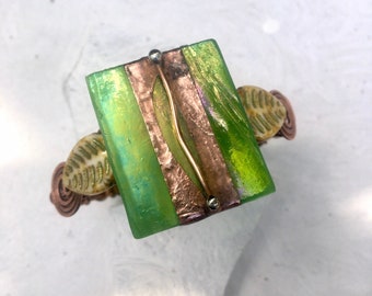 Green glass cuff, iridescent, copper, Czech glass leaf beads,