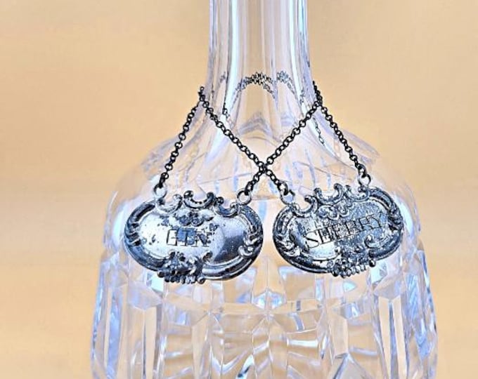 Featured listing image: Cut Crystal Decanter with Sterling Silver Tags – Gin & Sherry – 9” Tall – .6oz Sterling Total