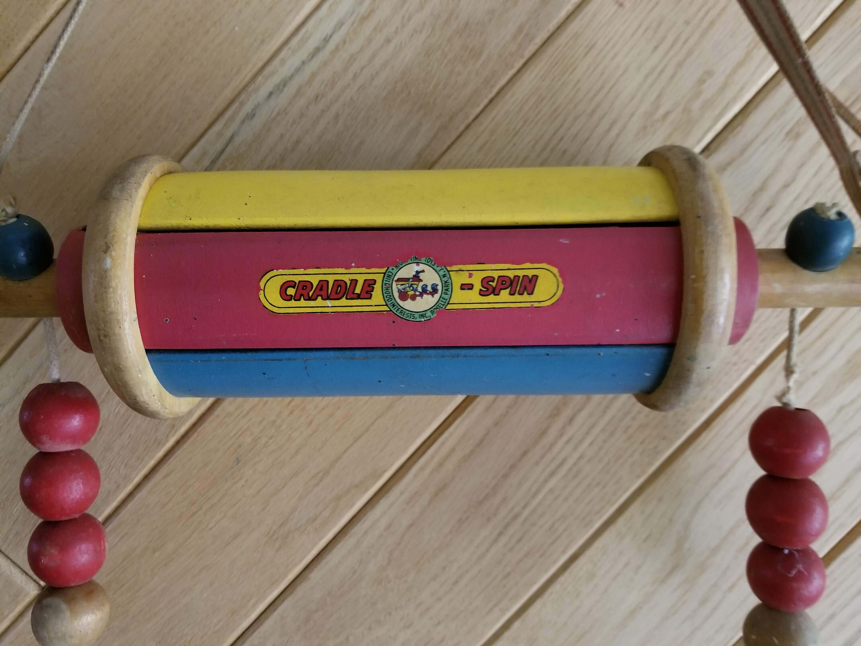 spinning baby toys above crib