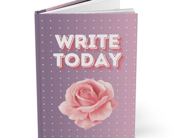May include: A purple journal with white polka dots and the text "WRITE TODAY" in white with a pink outline. A pink rose is centered on the front cover.