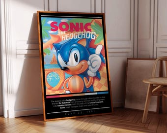 May include: A retro video game poster featuring Sonic the Hedgehog, a blue hedgehog with red shoes, against a colourful background. The poster includes the text "SONIC THE HEDGEHOG" and "JUNE 23, 1991".