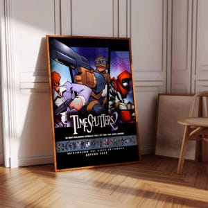 May include: A poster for the video game TimeSplitters 2, featuring three characters in a futuristic setting. The poster is in a wooden frame and is leaning against a white wall. The text on the poster reads "TimeSplitters 2", "The most exhilarating experience you'll get from your games console", "Outnumbered but never outgunned", and "Autumn 2002".