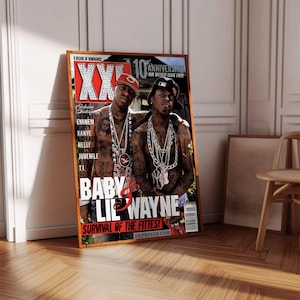 May include: A magazine cover featuring a photo of two men, Baby and Lil Wayne, with the title "Survival of the Fittest" and the magazine name "XXL" in large, bold letters. The cover is red, white, and black.