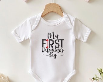 My First Valentine’s Day Baby Onesie. Organic Cotton Bodysuit. Sizes 0-24 Months. White and neutral color bodysuit. Red Arrow Design