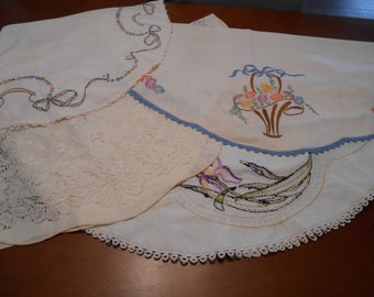 Four round table toppers, linen, lace, crocheted and embroidered, fun to change your table!