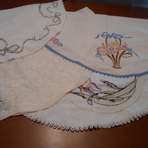 Four round table toppers, linen, lace, crocheted and embroidered, fun to change your table!