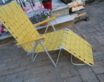 Vintage aluminum folding lawn chair lounger chaise lounge webbed Yellow with tiny blackand orange stripes, Still in plastic, NOS Excellent