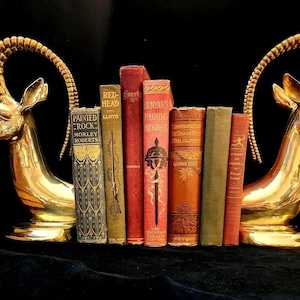 Vintage MCM Pair of Ibex Heavy High Gloss Brass Bookends