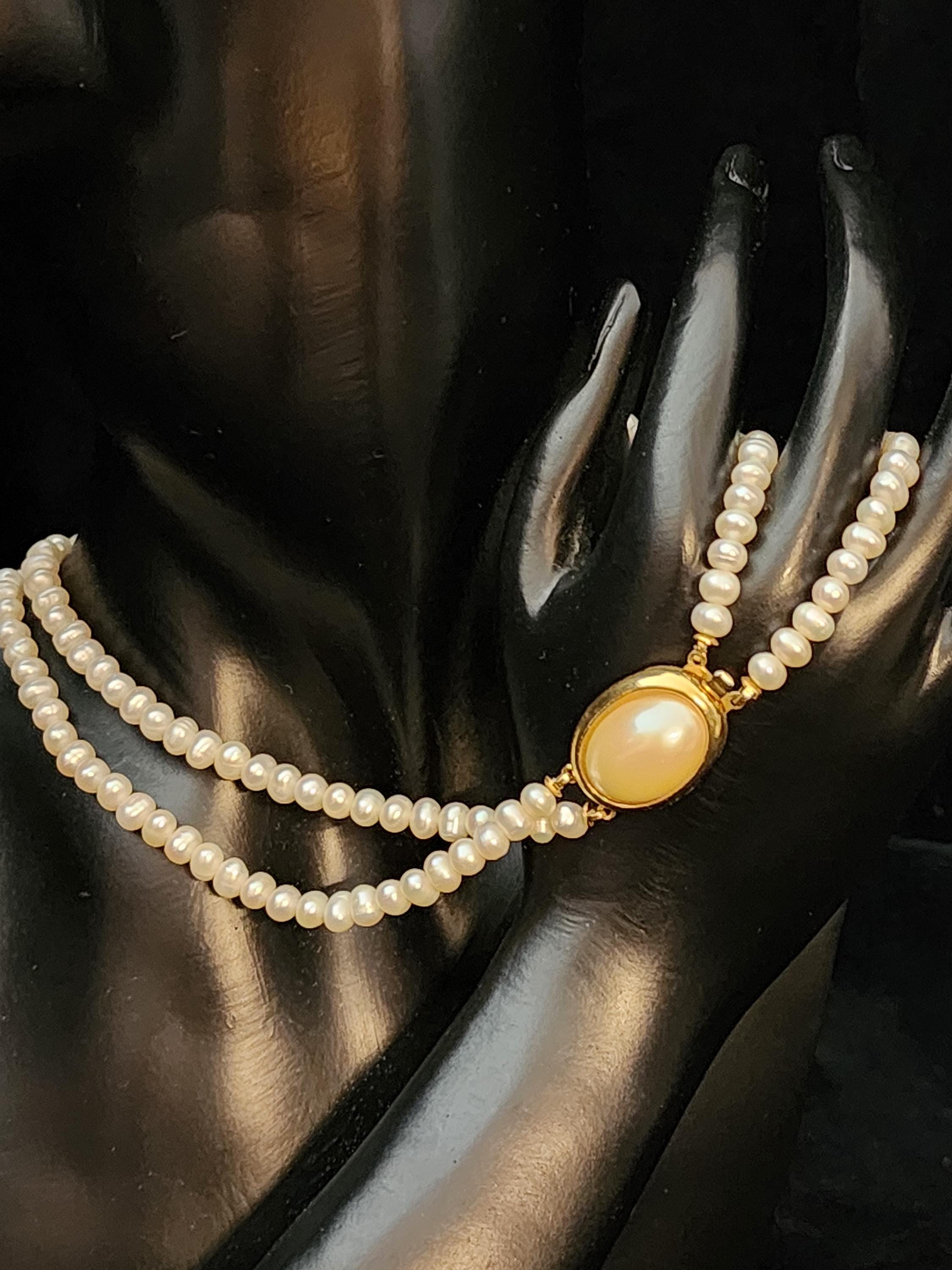 Vintage Trifari 2 Strand Pearl Necklace With Goldtone  Vintage TRIFARI Double Strand Simulated Pearl Necklace W/ Gold-Tone Statement Cl main image 0