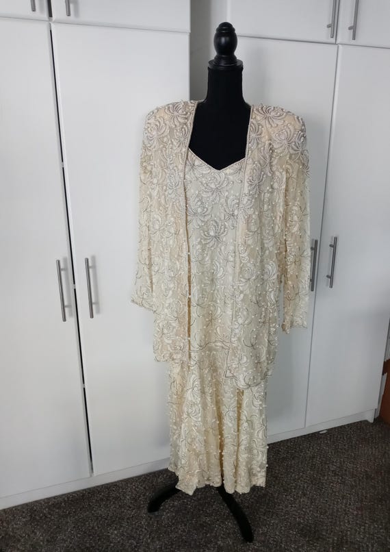 beaded jacket dresses Melyann Pillar Ladies Nude Patent Heel Dress Shoes – Frankel's Designer  Shoes main image 1