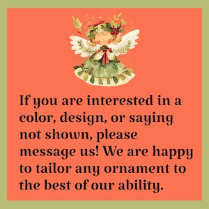 May include: A square graphic with an orange background and a green border featuring an illustration of an angel with white wings and a green dress. The text reads: If you are interested in a color, design, or saying not shown, please message us!