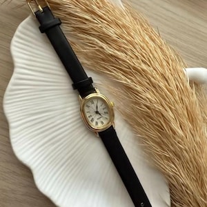 Orologio da polso da donna Rubsey Minimal con cinturino in pelle e cassa in oro, modello piccolo