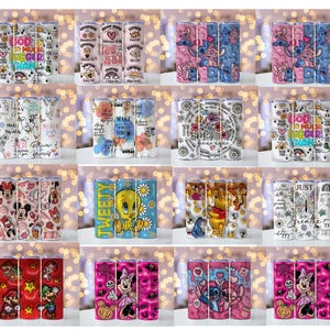 May include: A collection of insulated tumblers with various designs. Some tumblers feature cartoon characters like Mickey Mouse, Stitch, and Winnie the Pooh. Others display inspirational quotes and floral patterns. The tumblers are cylindrical and come in various colors.