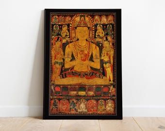 May include: Framed artwork featuring a seated figure with a golden complexion, adorned with intricate jewelry and a halo. The artwork, in shades of gold, red, and black, is framed in a black border. The image is displayed on a wooden floor.