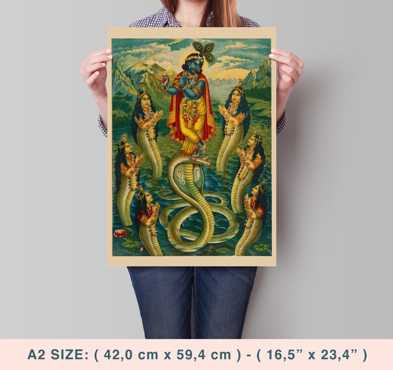 May include: A vintage-style print featuring a deity in blue playing a flute, standing on a cobra, surrounded by figures with serpent bodies. The artwork has a yellow and green color palette, with a mountain backdrop. The print measures 16.5" x 23.4".