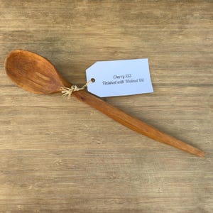 Hand carved cherry wood cooking spoon