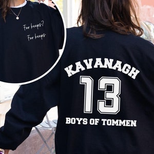 May include: Black sweatshirt with white text on the front and back. The front says "For keeps? For keeps". The back says "Kavanagh 13 Boys of Tommen".