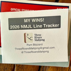 May include: A white card with the text "MY WINS! 2026 NMJL Line Tracker" in a gray rectangle. Below is a logo for Three Rivers Mahjong. The card also includes the name Pam Blizzard and contact information.