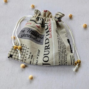 Borsa regalo riutilizzabile ed ecologica con stampa di giornale e fodera in raso - Confezione fatta a mano a zero sprechi
