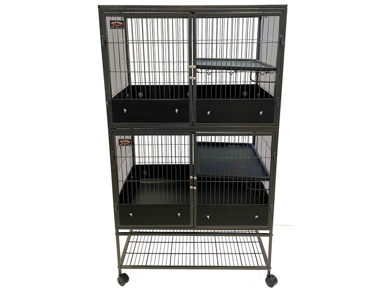 May include: Black metal cage with two levels and a bottom shelf. The cage has a black plastic tray and a metal ramp. The cage is on wheels.