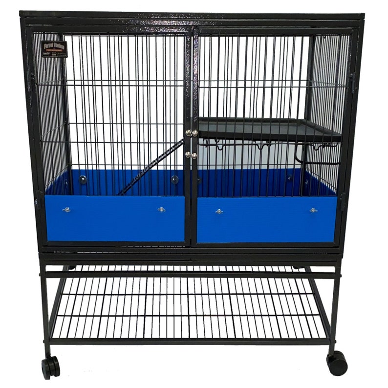 May include: Black metal cage with a blue plastic bottom and a shelf. The cage has a ramp and a door. The cage is on wheels.