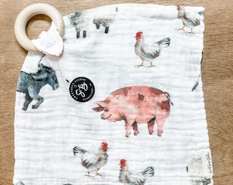 organic muslin gauze teether and swaddle - gentle farm animals