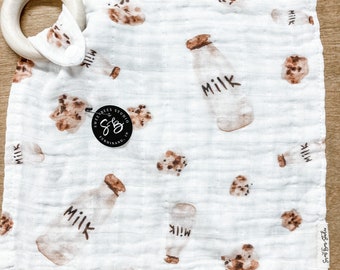 organic muslin gauze teether and swaddle - milk and cookies