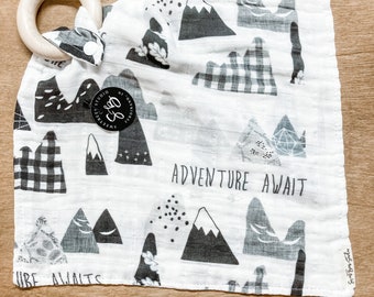 organic muslin gauze teether and swaddle - adventure awaits