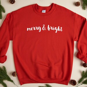 Merry & Bright - Christmas Sweatshirt | Holiday Sweatshirt | Fun Christmas Shirt | Women's Holiday Sweatshirt | Men's Holiday Sweatshir Red