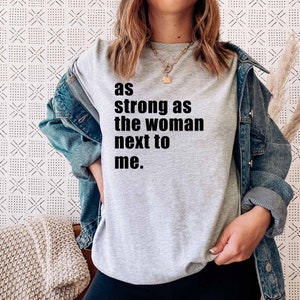 As Strong As The Woman Next To Me | T-Shirt | Female Empowerment Shirt | Feminist T-Shirt | Unisex Fit | Women&#39;s March Shirt
