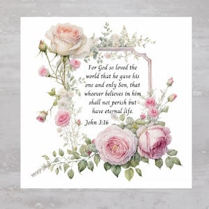May include: A white background with a floral design of pink roses and green leaves. The text "For God so loved the world that he gave his one and only Son, that whoever believes in him shall not perish but have eternal life. John 3:16" is written in black.