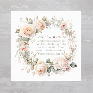 May include: A white background with a wreath of blush pink and white roses with green leaves. The wreath surrounds a quote from Proverbs 31:28-29, "Her children rise up and call her blessed; her husband also, and he praises her: Many women have done excellently, but you surpass them all."